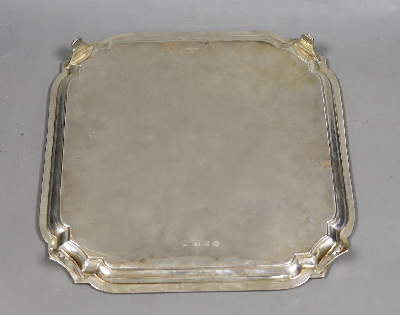 A George V square silver salver, with inswept corners, William Hutton & Sons, Sheffield, 1926, 25.3cm, 24.1oz.